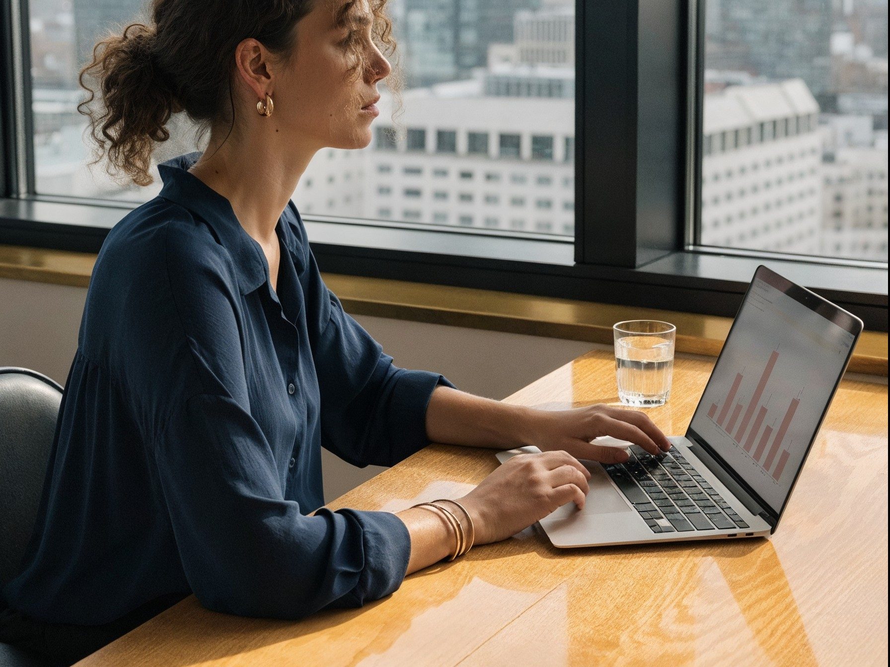 Marketing consultant reviewing a chart in a London office